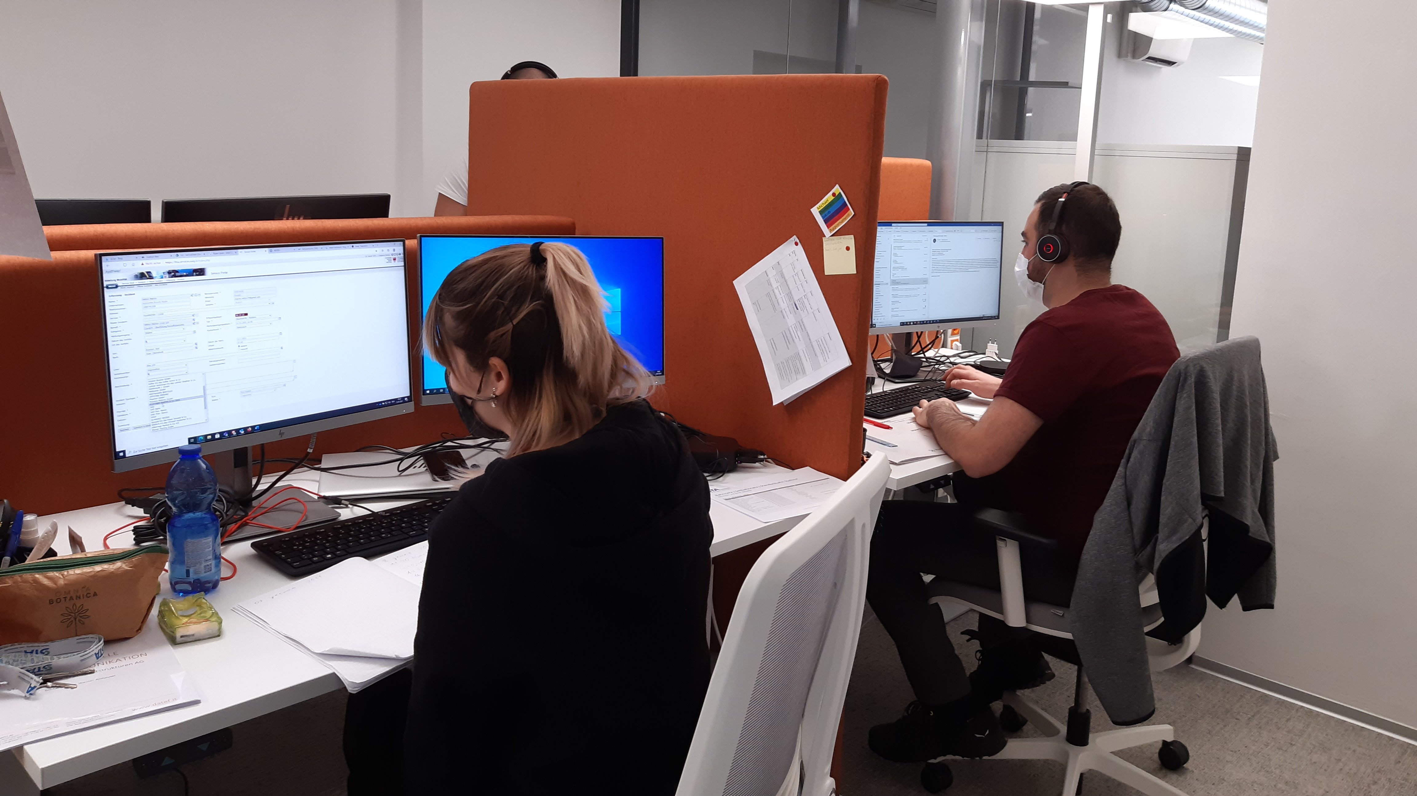 People working at the service and information center